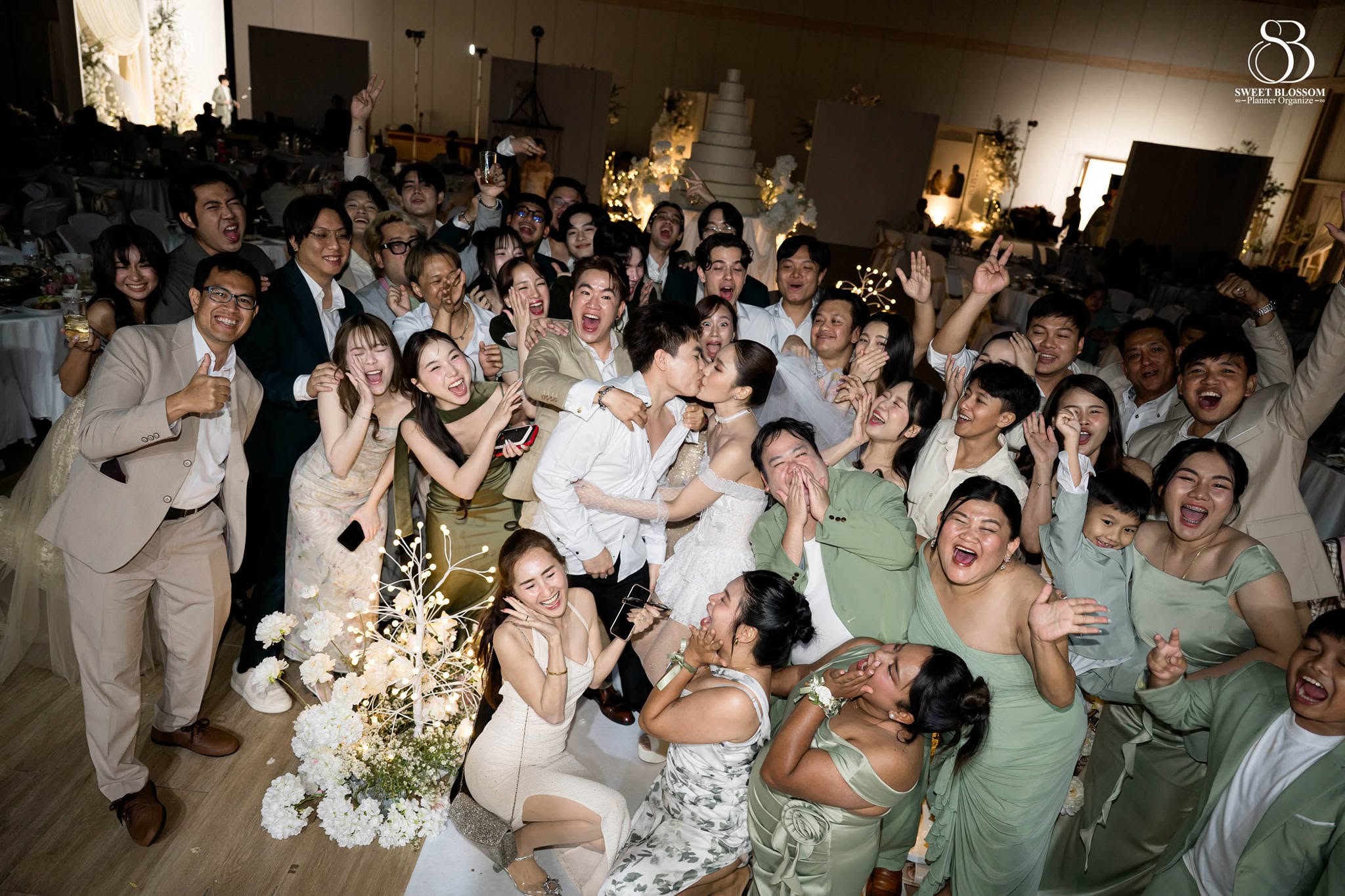 Sweet Blossom Wedding Planner joyful after party wedding group moment