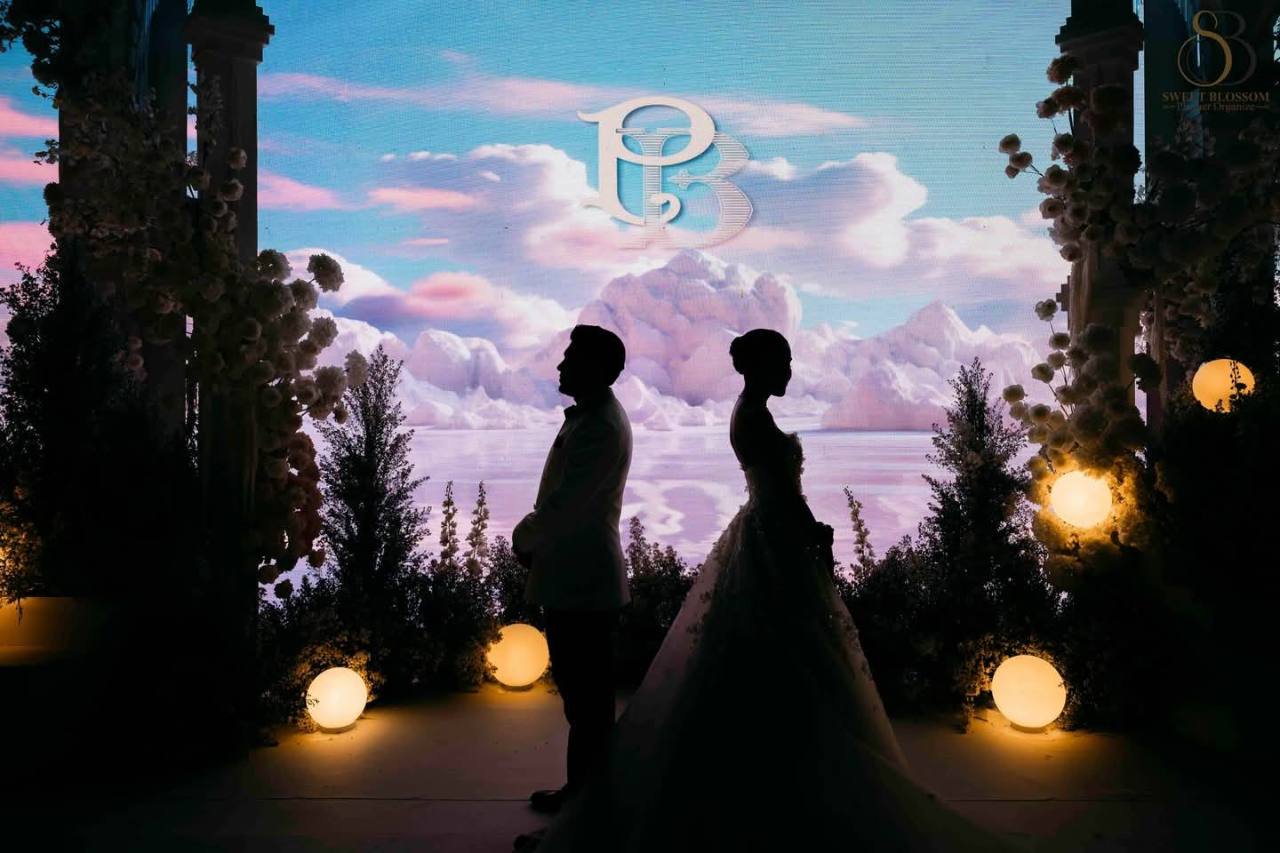 Sweet Blossom Wedding Planner silhouette couple portrait with LED cloud stage